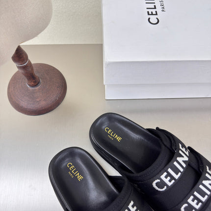 CELINE 25S FLAT SANDALS ARC DE TRIOMPHE IN BLACK CALFSKIN AND CANVAS