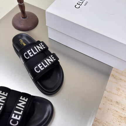 CELINE 25S FLAT SANDALS ARC DE TRIOMPHE IN BLACK CALFSKIN AND CANVAS