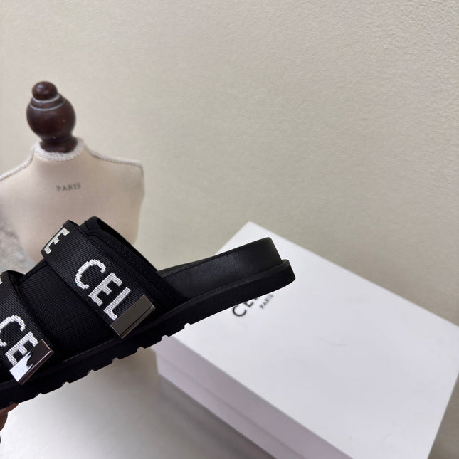 CELINE 25S FLAT SANDALS ARC DE TRIOMPHE IN BLACK CALFSKIN AND CANVAS