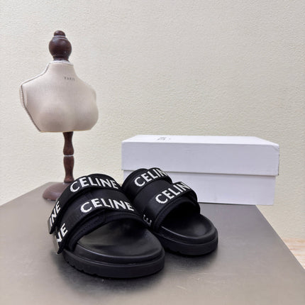 CELINE 25S FLAT SANDALS ARC DE TRIOMPHE IN BLACK CALFSKIN AND CANVAS