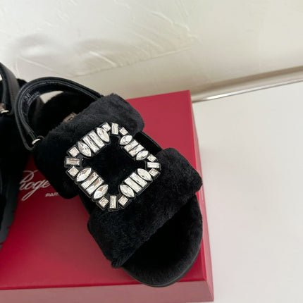 SLIDY VIV' WINTER FUR STRASS BUCKLE SANDALS IN BLACK SHEARLING