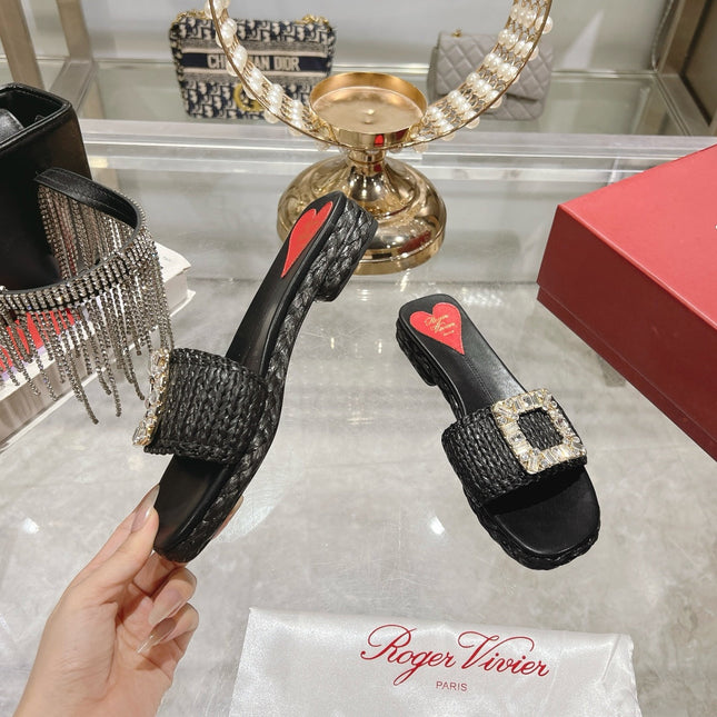 ESPADRILLES MULES IN BLACK RAFFIA