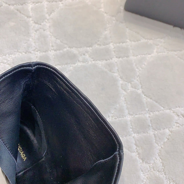 POINTED-TOE HIGH HEEL BOOTS IN BLACK SMOOTH LAMBSKIN