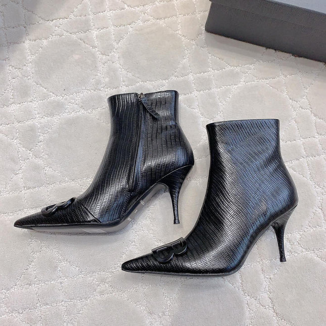 POINTED-TOE HIGH HEEL BOOTS IN BLACK LIZARD EMBOSSED CALFSKIN