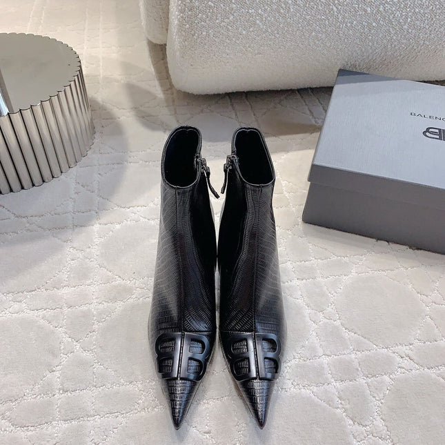 POINTED-TOE HIGH HEEL BOOTS IN BLACK LIZARD EMBOSSED CALFSKIN