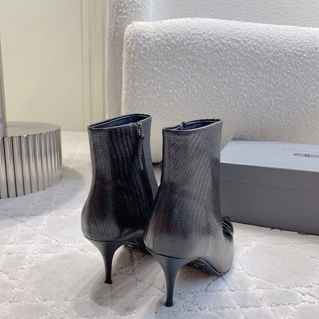 POINTED-TOE HIGH HEEL BOOTS IN BLACK LIZARD EMBOSSED CALFSKIN