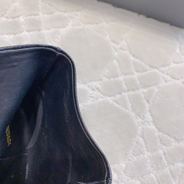 POINTED-TOE HIGH HEEL BOOTS IN BLACK LIZARD EMBOSSED CALFSKIN