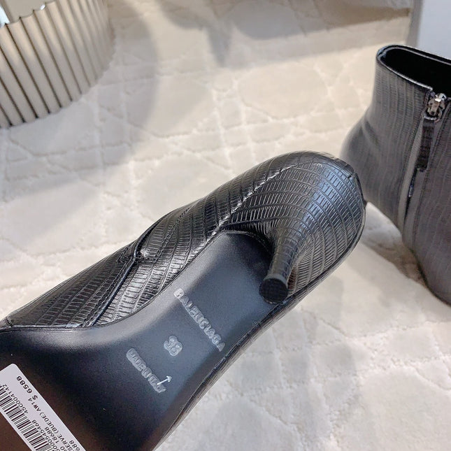 POINTED-TOE HIGH HEEL BOOTS IN BLACK LIZARD EMBOSSED CALFSKIN