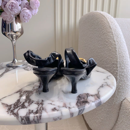 BALENCIAGA 25S HIGH SLINGBACK 35 MM IN BLACK LAMBSKIN WITH GOLD HARDWARE