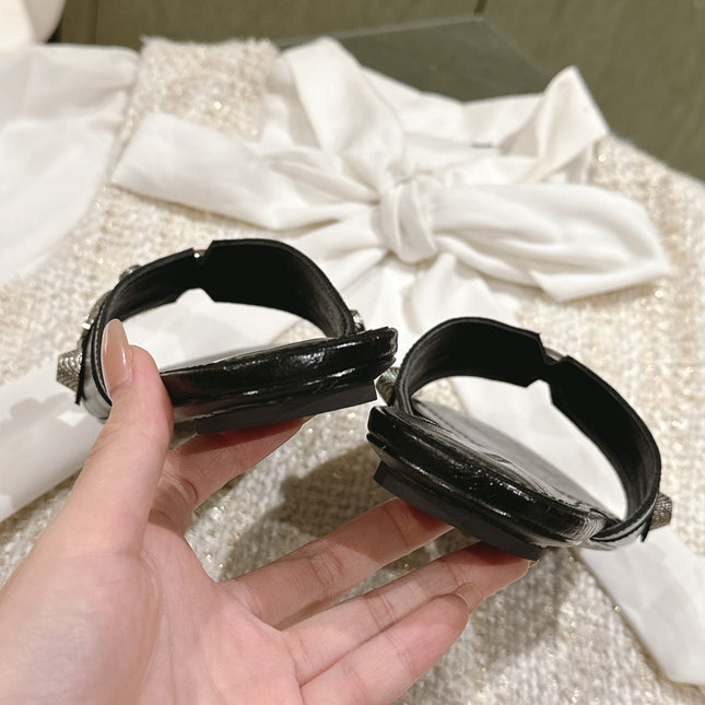 CAGOLE FLAT SANDALS IN BLACK WAX-OIL SHEEPSKIN