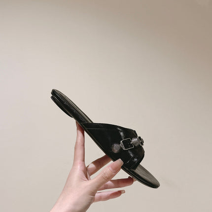CAGOLE FLAT SANDALS IN BLACK WAX-OIL SHEEPSKIN
