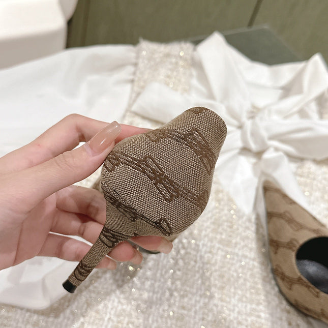 POINTED HIGH PUMPS IN BEIGE MONOGRAM JACQUARD FABRIC