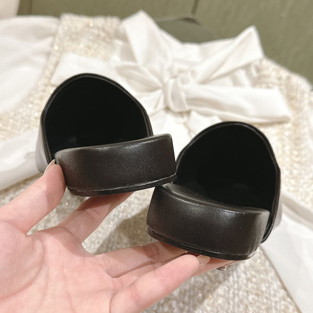 FLAT MULES IN BLACK SMOOTH CALFSKIN GOLD BUCKLE