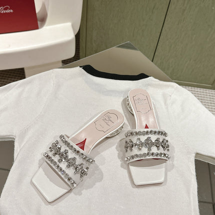 TRUMPET METALLIC MULES IN WHITE SMOOTH CALFSKIN WITH EMBELLISHED BUCKLE