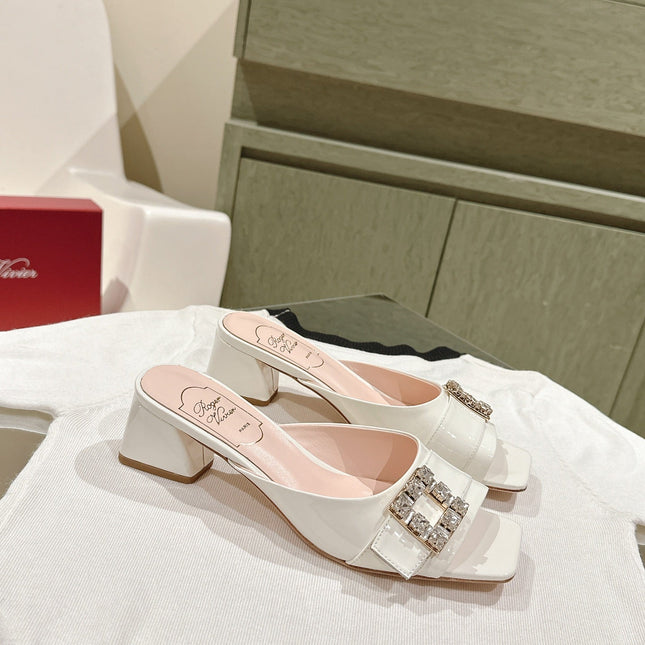 CRYSTAL HEEL MULE IN WHITE SHINY CALFSKIN WITH EMBELLISHED BUCKLE