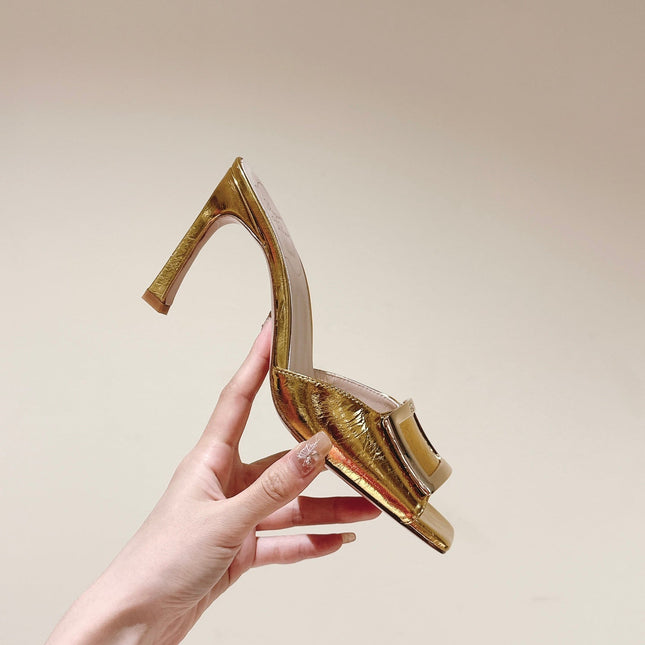 TRUMPET METALLIC MULES IN GOLD PATENT CALFSKIN