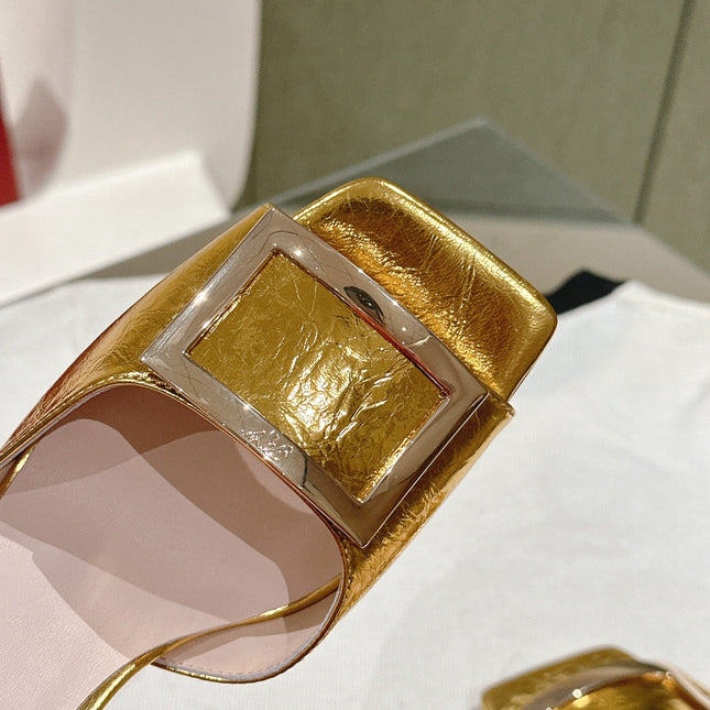 TRUMPET METALLIC MULES IN GOLD PATENT CALFSKIN