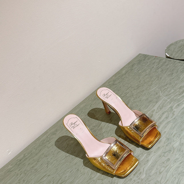 TRUMPET METALLIC MULES IN GOLD PATENT CALFSKIN