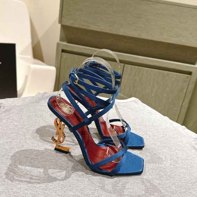 YSL 25S HIGH-HEEL SANDALS 100 MM IN DEEP NAVY BLUE SATIN WITH YSL LOGO HEEL DESIGN IN GOLD