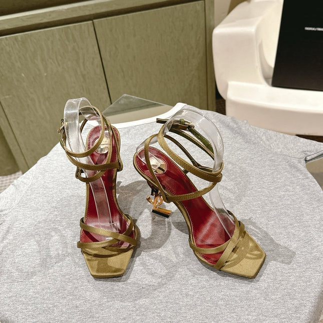 YSL 25S HIGH-HEEL SANDALS 100 MM IN MOSS GREEN SATIN WITH YSL LOGO HEEL DESIGN IN GOLD