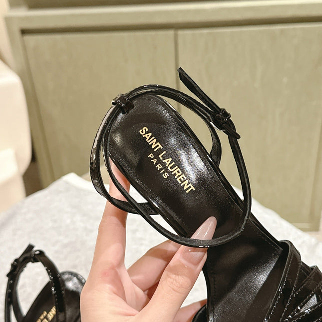 YSL 25S HIGH-HEEL SANDALS 100 MM IN BLACK GLOSSY LAMBSKIN WITH YSL LOGO HEEL DESIGN IN GOLD