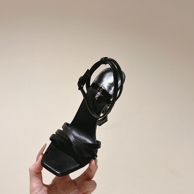 YSL 25S HIGH-HEEL SANDALS 100 MM IN BLACK LAMBSKIN WITH YSL LOGO HEEL DESIGN