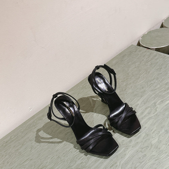 YSL 25S HIGH-HEEL SANDALS 100 MM IN BLACK LAMBSKIN WITH YSL LOGO HEEL DESIGN