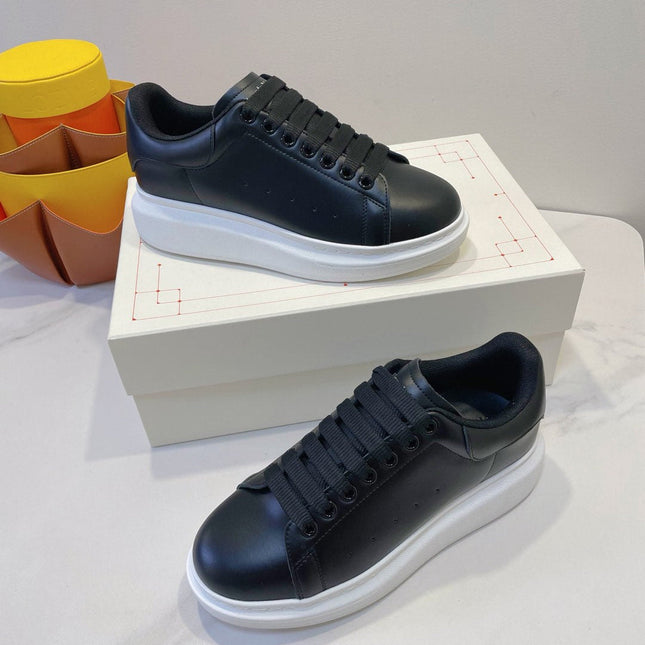 OVERSIZED SNEAKERS IN BLACK SMOOTH CALFSKIN WITH BLACK HEEL DETAIL