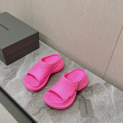 POOL CROCS SLIDE SANDAL IN BRIGHT PINK RUBBER