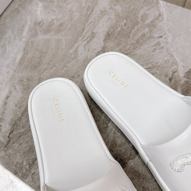 THICK-SOLED SLIDES IN WHITE SMOOTH LAMBSKIN LOGO WITH CRYSTALS