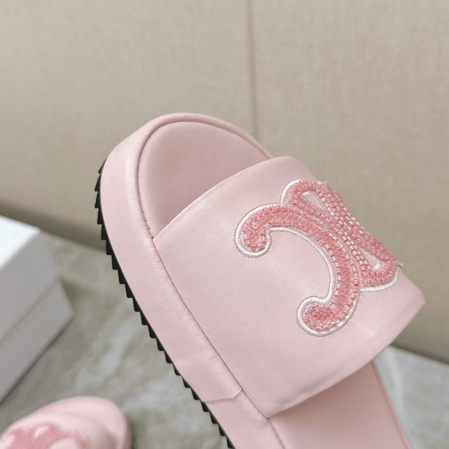 THICK-SOLED SLIDES IN LIGHT PINK SMOOTH LAMBSKIN LOGO WITH CRYSTALS