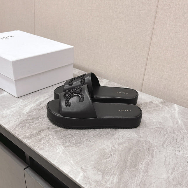 THICK-SOLED SLIDES IN BLACK SMOOTH LAMBSKIN LOGO WITH CRYSTALS