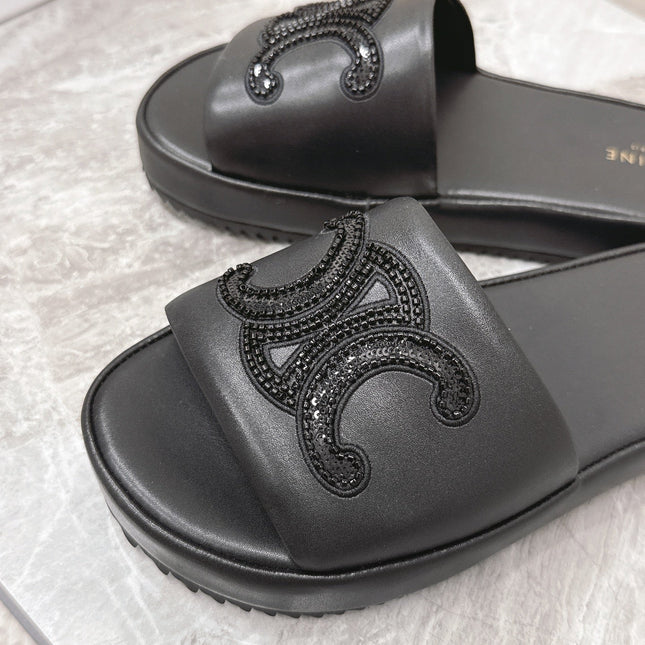 THICK-SOLED SLIDES IN BLACK SMOOTH LAMBSKIN LOGO WITH CRYSTALS