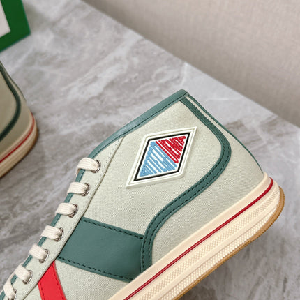 ELIOT SNEAKER IN GREEN PASTEL CANVAS AND CALFSKIN