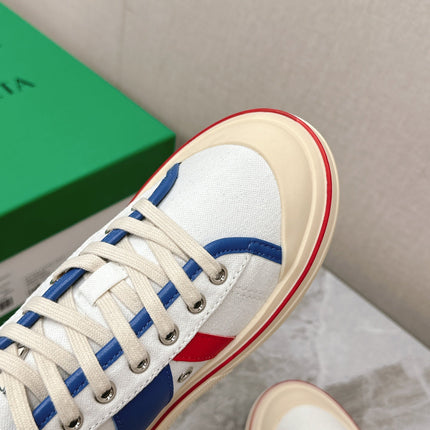 ELIOT SNEAKER IN WHITE CANVAS WITH NAVY BLUE CALFSKIN