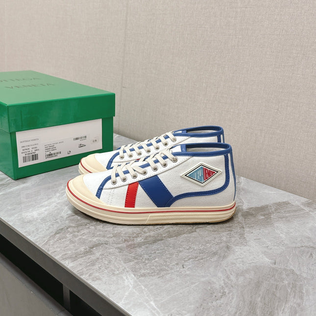 ELIOT SNEAKER IN WHITE CANVAS WITH NAVY BLUE CALFSKIN