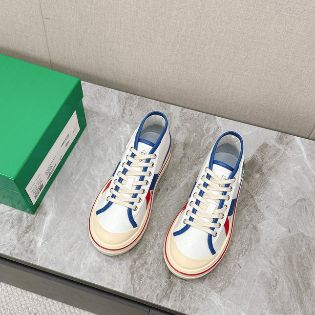 ELIOT SNEAKER IN WHITE CANVAS WITH NAVY BLUE CALFSKIN