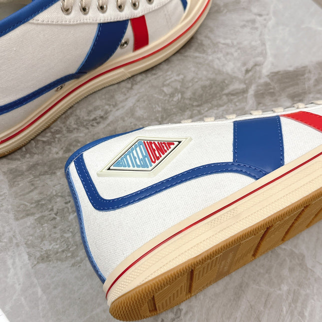 ELIOT SNEAKER IN WHITE CANVAS WITH NAVY BLUE CALFSKIN