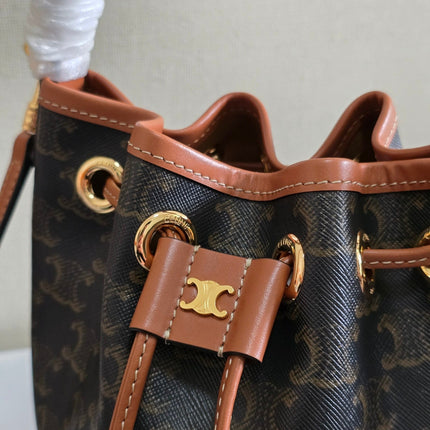 CLARA BAG 19 IN BLACK TRIOMPHE CANVAS AND BROWN CALFSKIN TRIM