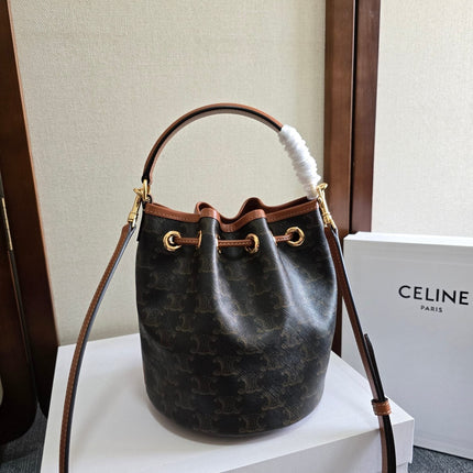 CLARA BAG 19 IN BLACK TRIOMPHE CANVAS AND BROWN CALFSKIN TRIM