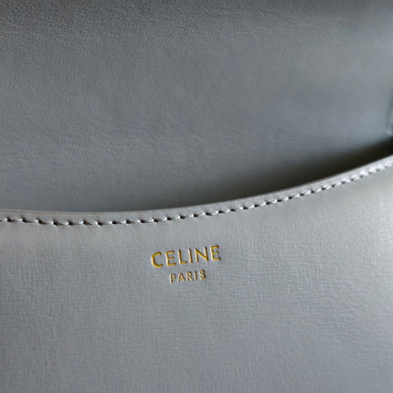 TEEN LOLA TRIOMPHE BAG 20 IN COOL GRAY BLUE CALFSKIN