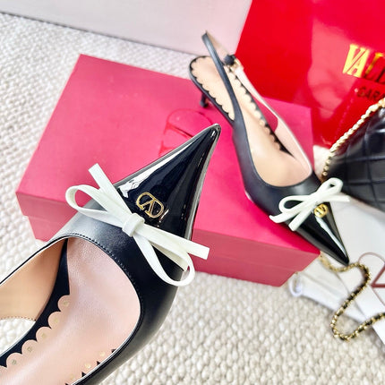 VLTN HIGH SLINGBACK 25S 40 MM IN BLACK LAMBSKIN WITH BOW