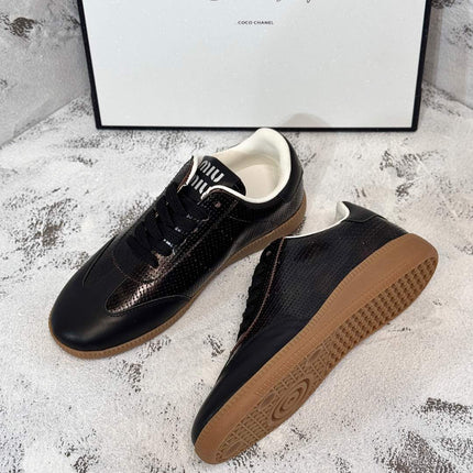 RETRO SNEAKERS IN BLACK LAMBSKIN WITH KNITTED PATTERN