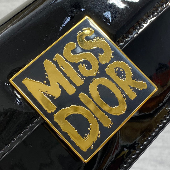 FLAP BAG 18 IN BLACK PATENT CALFSKIN