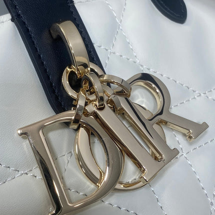 DIOR 25S TOUJOURS VERTICAL NANO TOTE BAG 18 IN IVORY BLACK MACROCANNAGE CALFSKIN