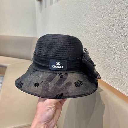 STRAW HAT WITH CHIFFON FLOWER BLACK 672760