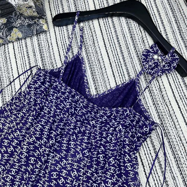 CHANEL DARK PURPLE SILK CAMELLIA DRESS WITH PEARL DETAILS