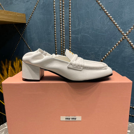 HIGH BROGUE LOAFERS IN WHITE LAMBSKIN