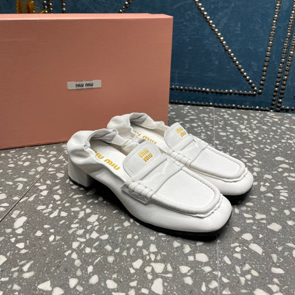 HIGH BROGUE LOAFERS IN WHITE LAMBSKIN