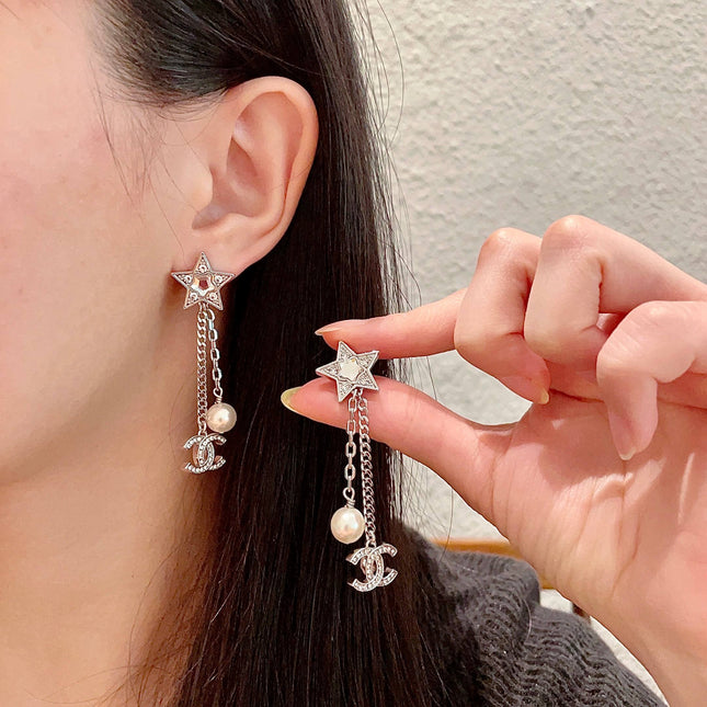 DOUBLE C STUD EARRINGS WITH STAR STONE DOUBLE CHAINS ONE WITH LOGO AND ONE WITH PEARL